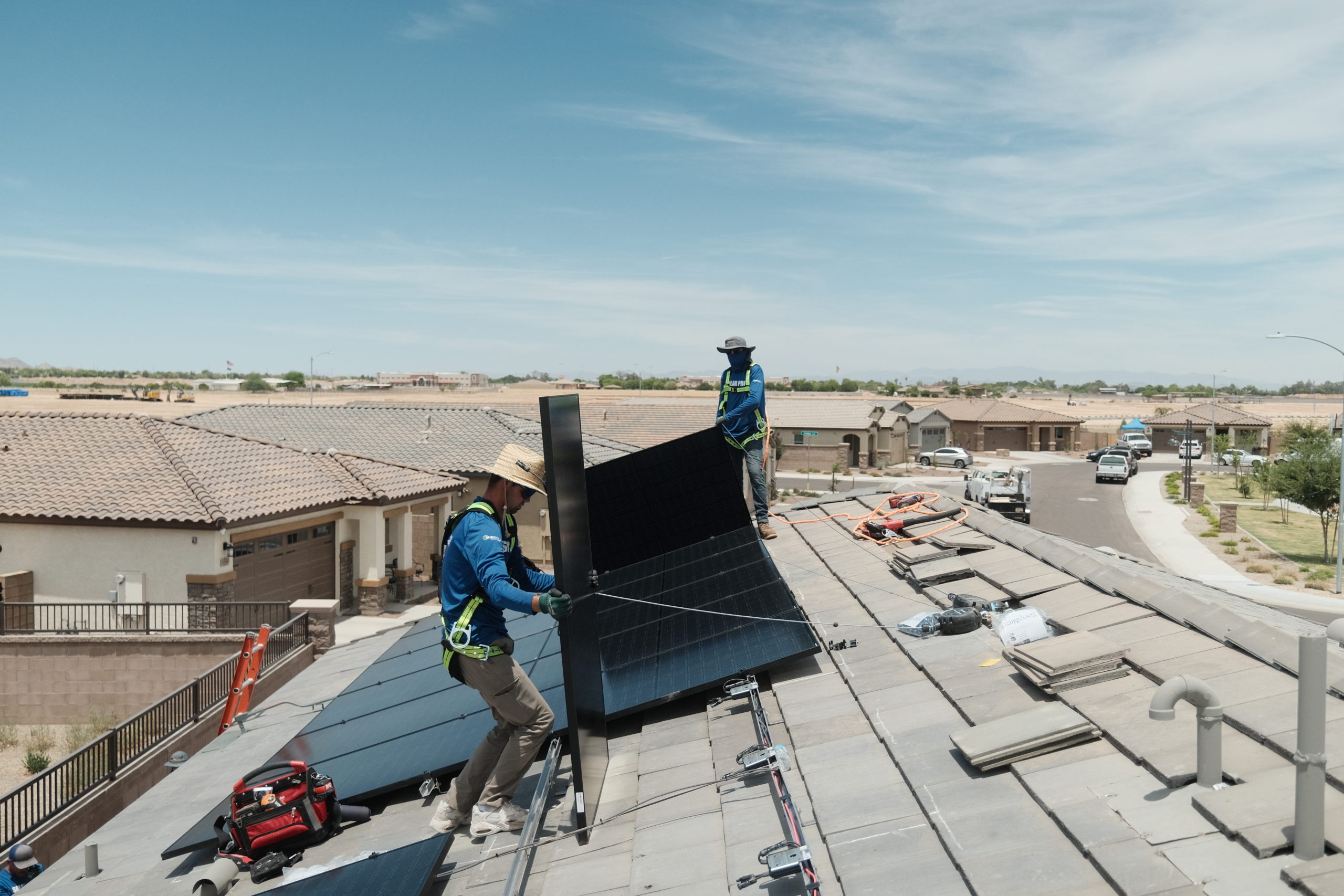 Solar Installers Doing A Residential Instillation