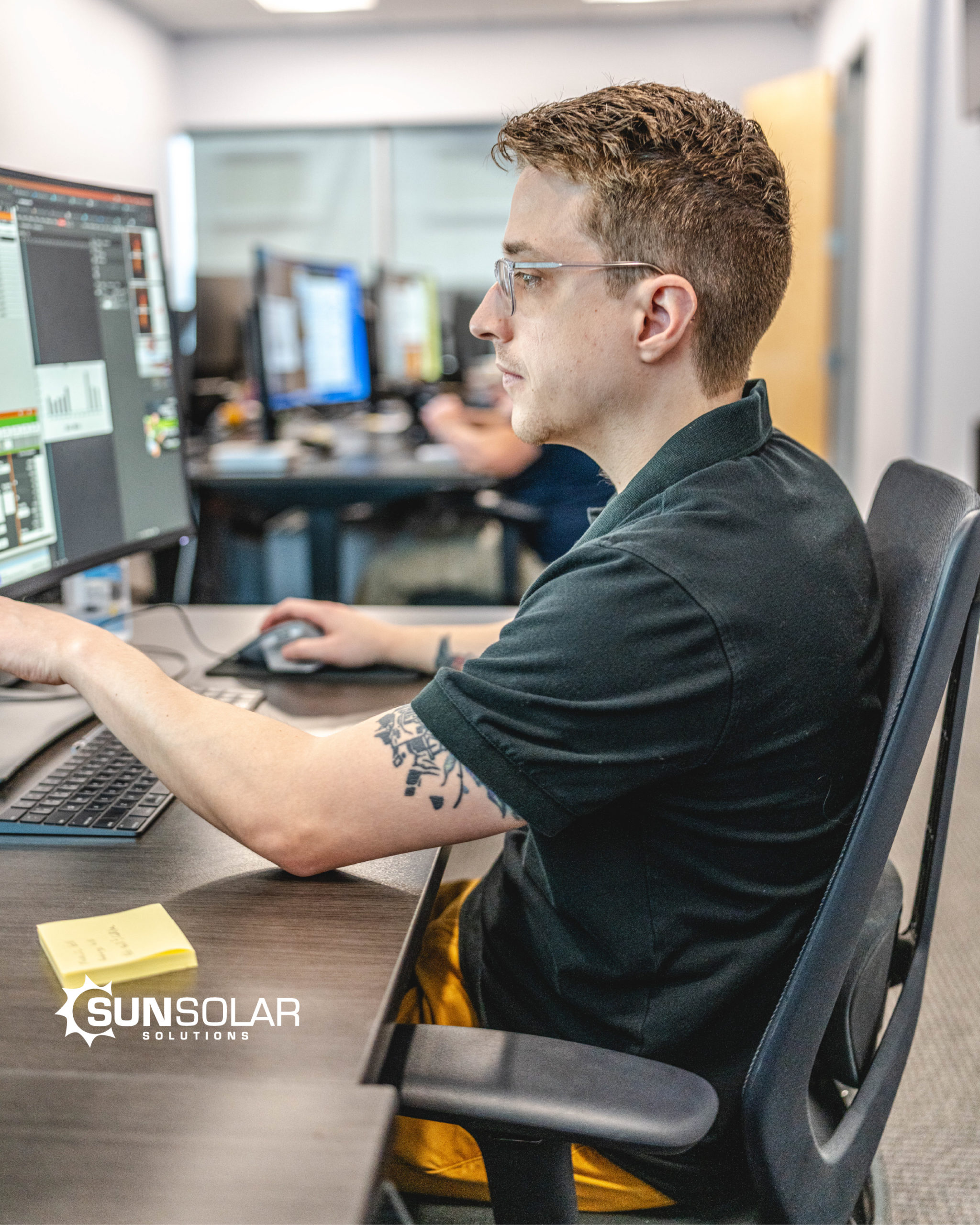 SUNSOLAR SOLUTIONS Employee Working On Solar Design For A Roof