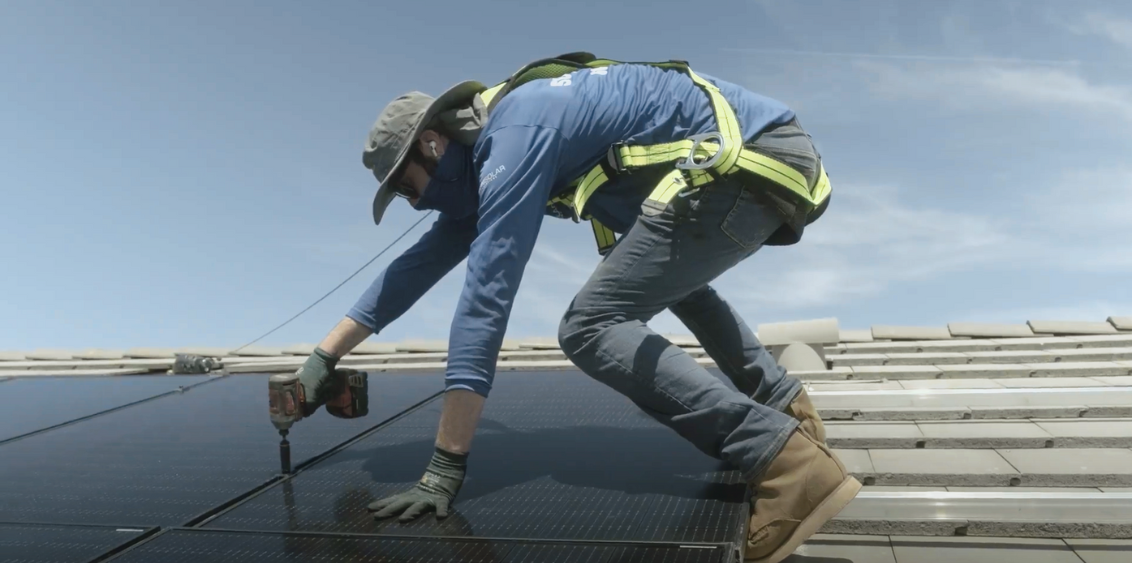 Sunsolar Employee installing solar system