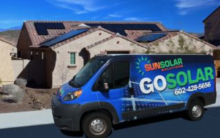 SUNSOLAR SOLUTIONS Go Solar van parked in front of a solar-powered home, showcasing residential solar panel installations.