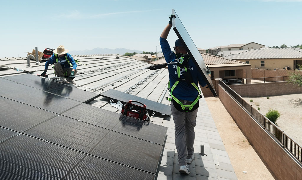 Sunsolar Employees are installing a solar system on a home.