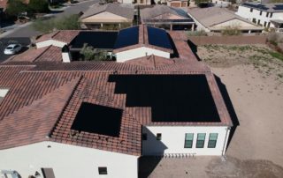 Aerial view of residential solar panel installation by SUNSOLAR SOLUTIONS for energy efficiency.