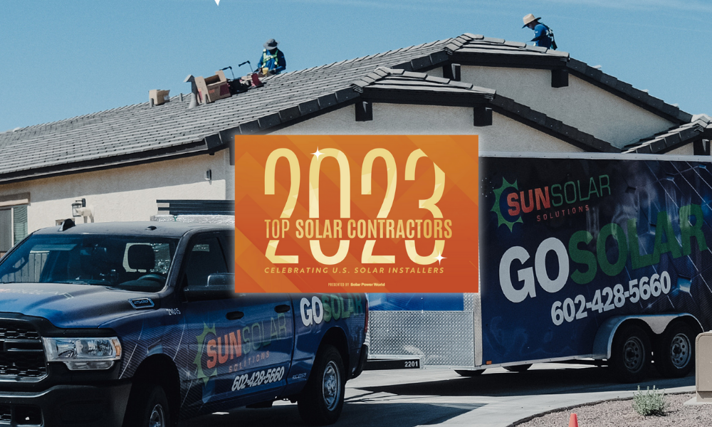 2023 Top Solar Contractor badge in front of SUNSOLAR SOLUTIONS installation photo